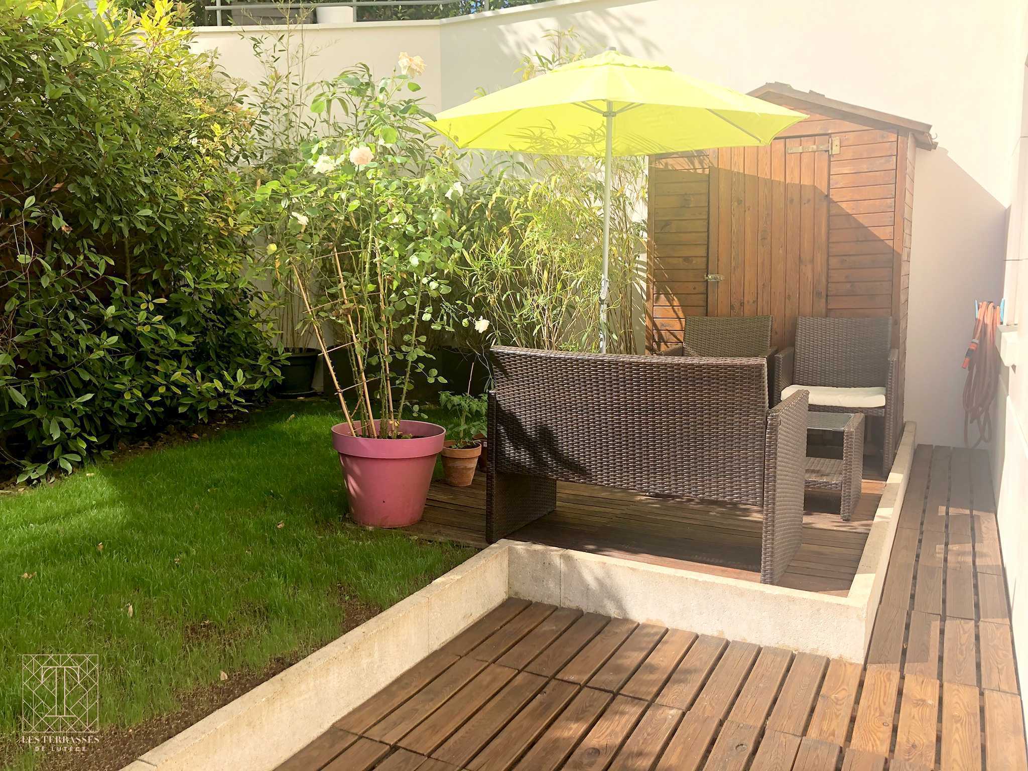 Photo n°14 du bien immobilier Issy-Les-Moulineaux : Appartement 4 pièces avec une terrasse et un jardin