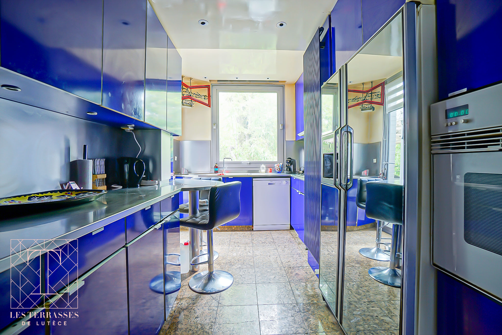 Photo n°9 du bien immobilier Élégante meulière de caractère avec jardin paysager