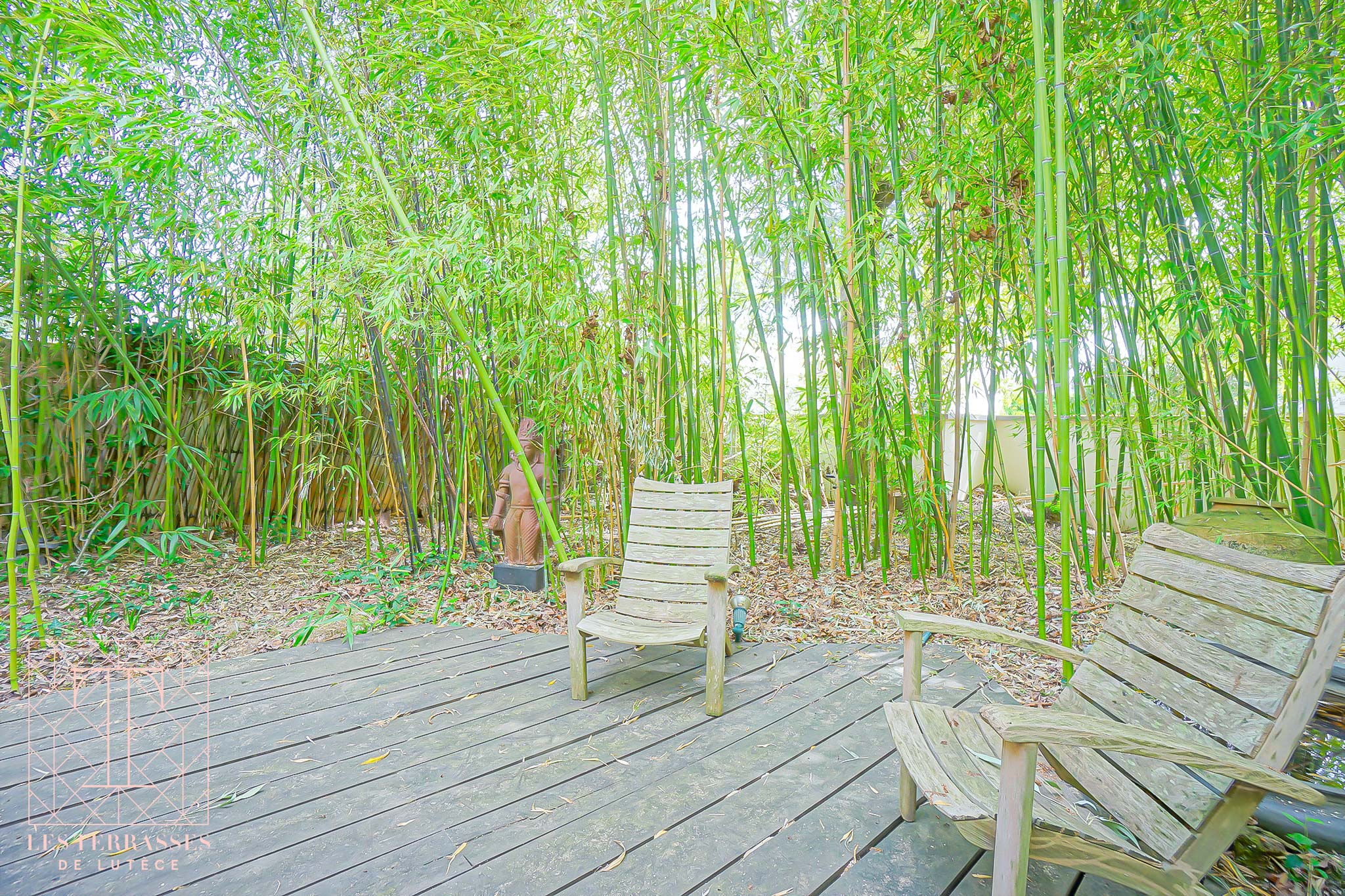 Photo n°2 du bien immobilier Élégante meulière de caractère avec jardin paysager